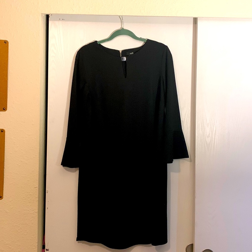 Poly blend black dress with flutter sleeves at the wrist. Worn once !